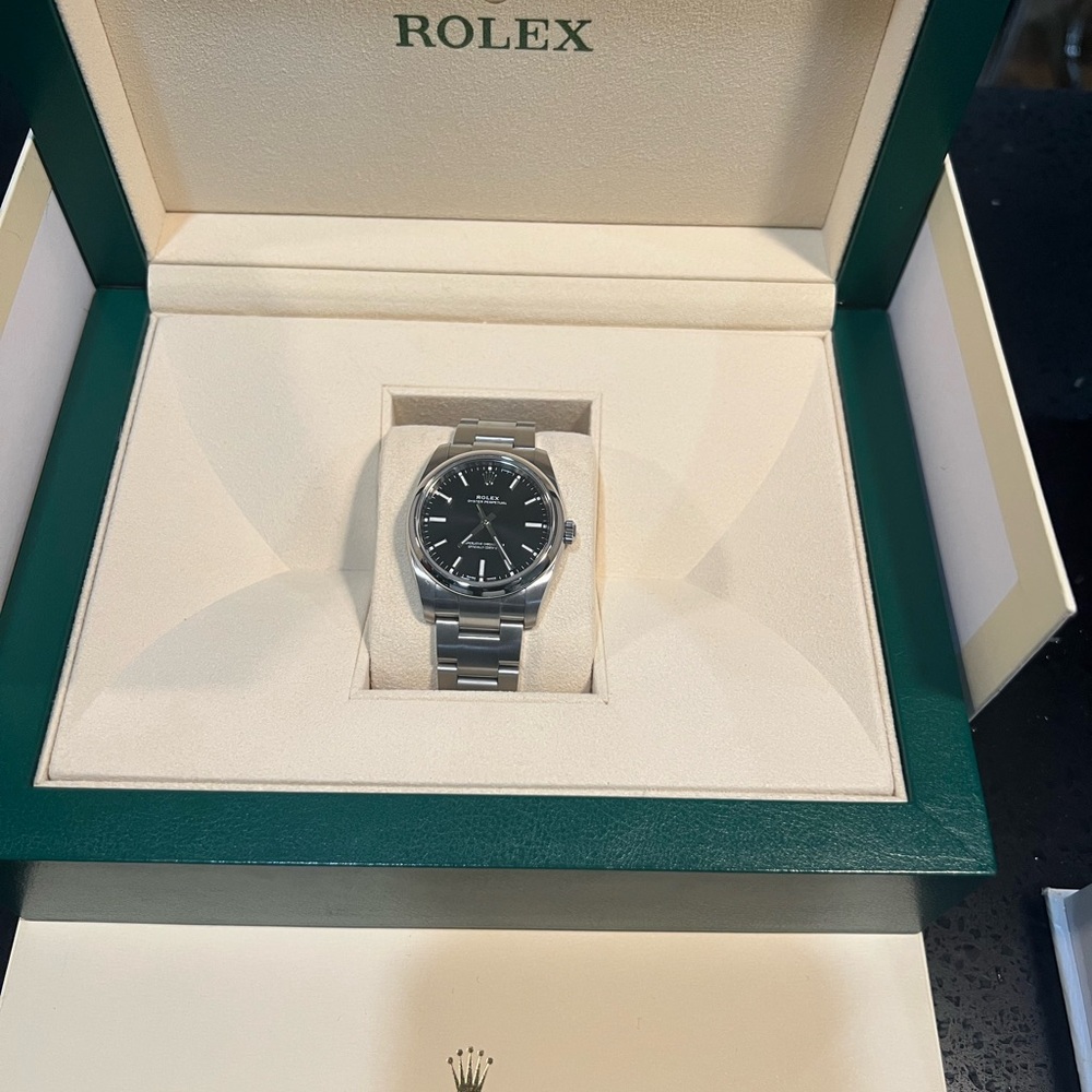 Rolex Black Dial with Silver Bracelet